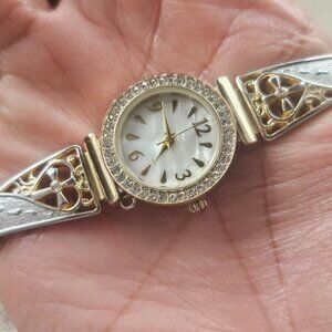 Accutime Ladies Wristwatch Gold Tone Cuff Band Stretched Metal Band Wrist Watch